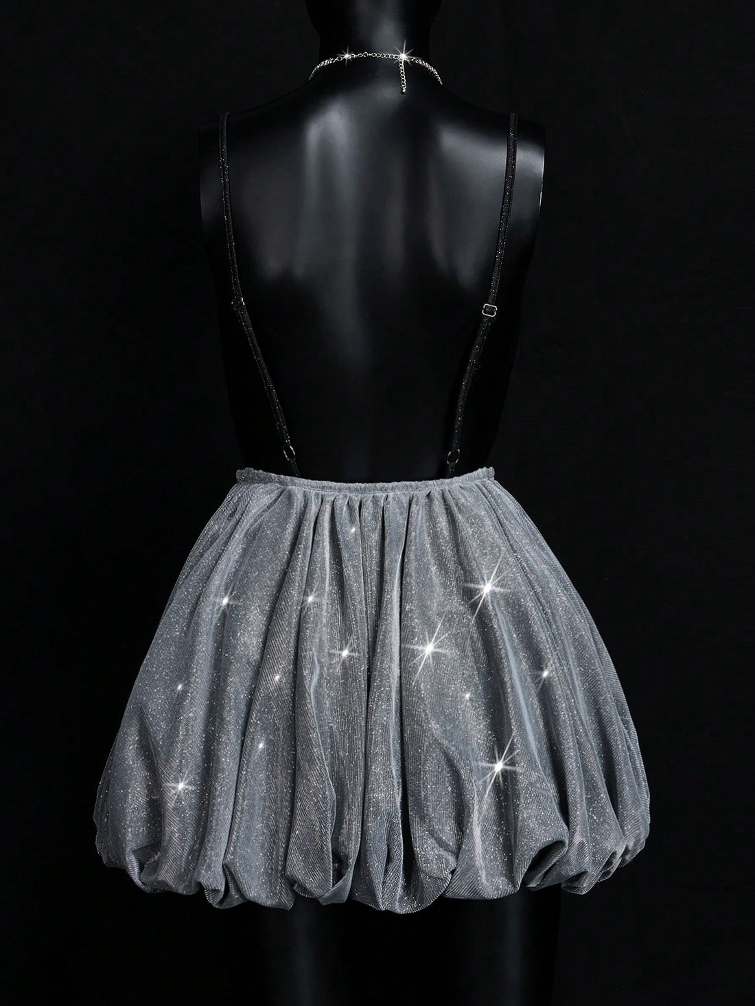 Shimmer and shine your way through any soirée in this eye-catching Silver Metallic Deep V Cami Dress! With its flirty neckline and party-ready metallic finish, you'll be turning heads faster than a disco ball. Perfect for fancy tea parties where you want to be the sugar cube that sparkles, or night events where you're aiming to outshine the moon. Slip it on and watch your confidence level skyrocket!