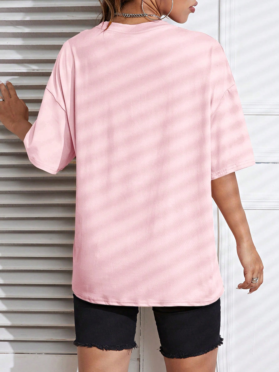 Elevate your everyday look with our Casual Chic oversized t-shirt. Featuring a playful slogan print and scoop neck, this tee effortlessly adds style to any outfit. Comfortable and stylish, it's the perfect addition to your wardrobe. (And it's perfect for those days when you just can't even, ya know?)