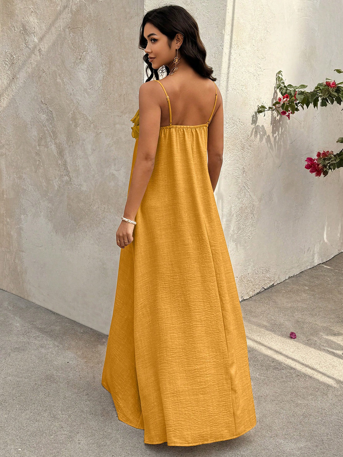 Get ready to turn heads with our Women's Floral Camisole A-Line Dress! This versatile dress is a must-have for your vacation wardrobe, perfect for a day on the beach or a night out. The flowy A-line silhouette and vibrant floral print will keep you feeling cool and stylish all day long. Say yes to effortless, casual chic!