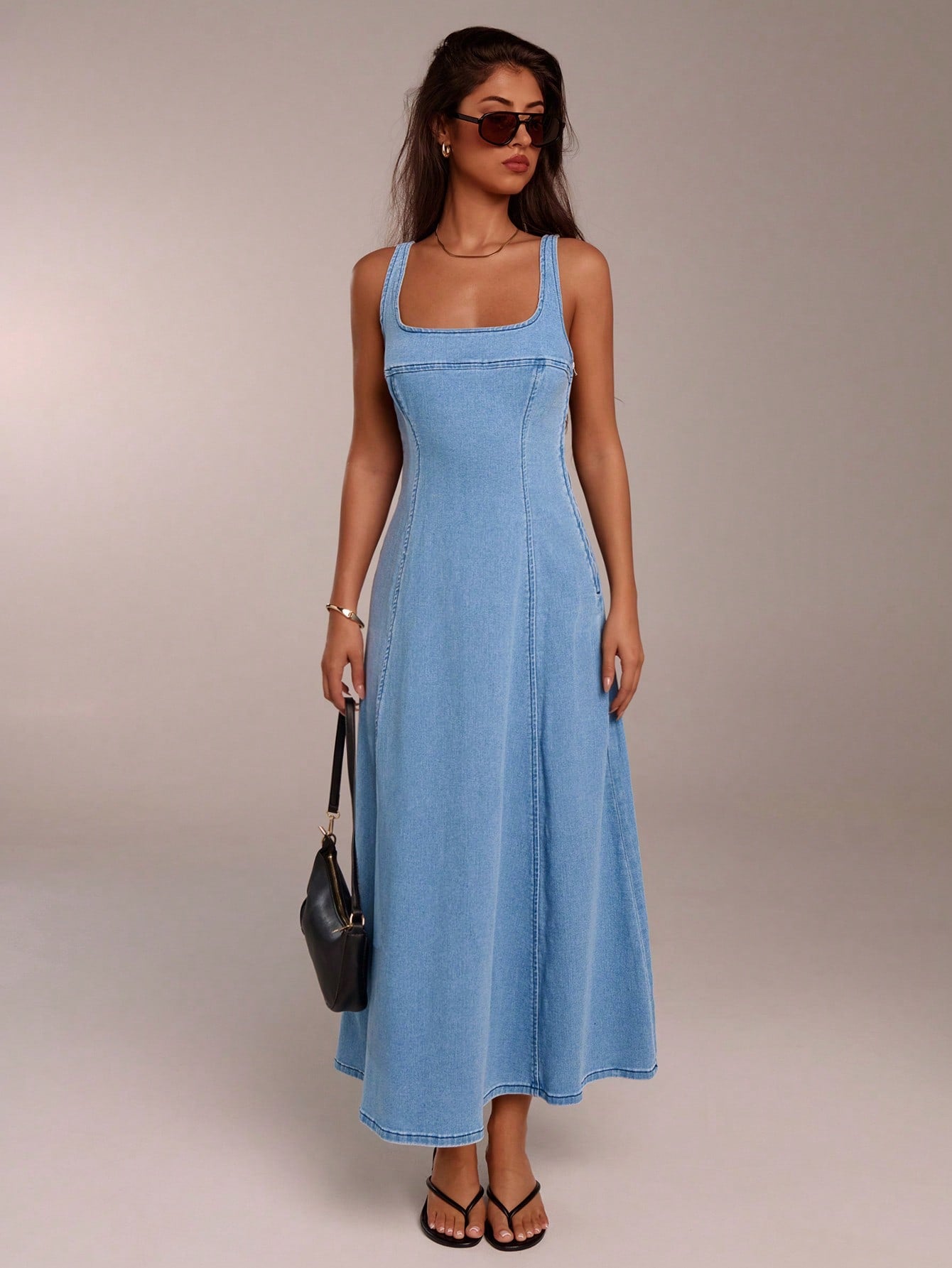 Elegant Blue Denim Dress for Summer Events and Casual Outings - Versat Canary Houze Elegant Blue Denim Dress for Summer Events and Casual Outings - Versat Canary Houze