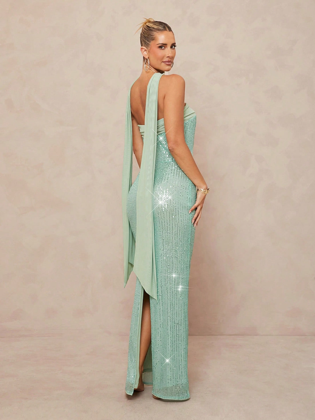 Turn heads at summer weddings or beach outings with this Elegant Boho Mermaid Dress. The sage green hue complements sun-kissed skin, while shimmering sequins add a touch of magic. The lace-up back design lets you show off a little flair and adjust the fit perfectly. Flowing and flirty, it blends boho charm with mermaid elegance for a look that’s effortlessly playful and unforgettable.