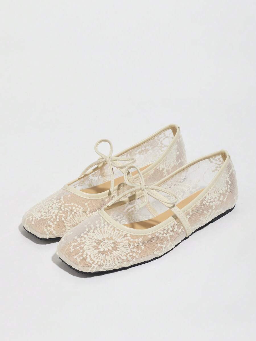 Step into summer with these chic white ballet flats, featuring a playful bow and delicate floral embroidery. Crafted with breathable mesh, they keep your feet cool and comfy all day long. Perfect as Mary Jane sandals, they add a touch of whimsy and charm to any outfit, making every step feel light and fun.