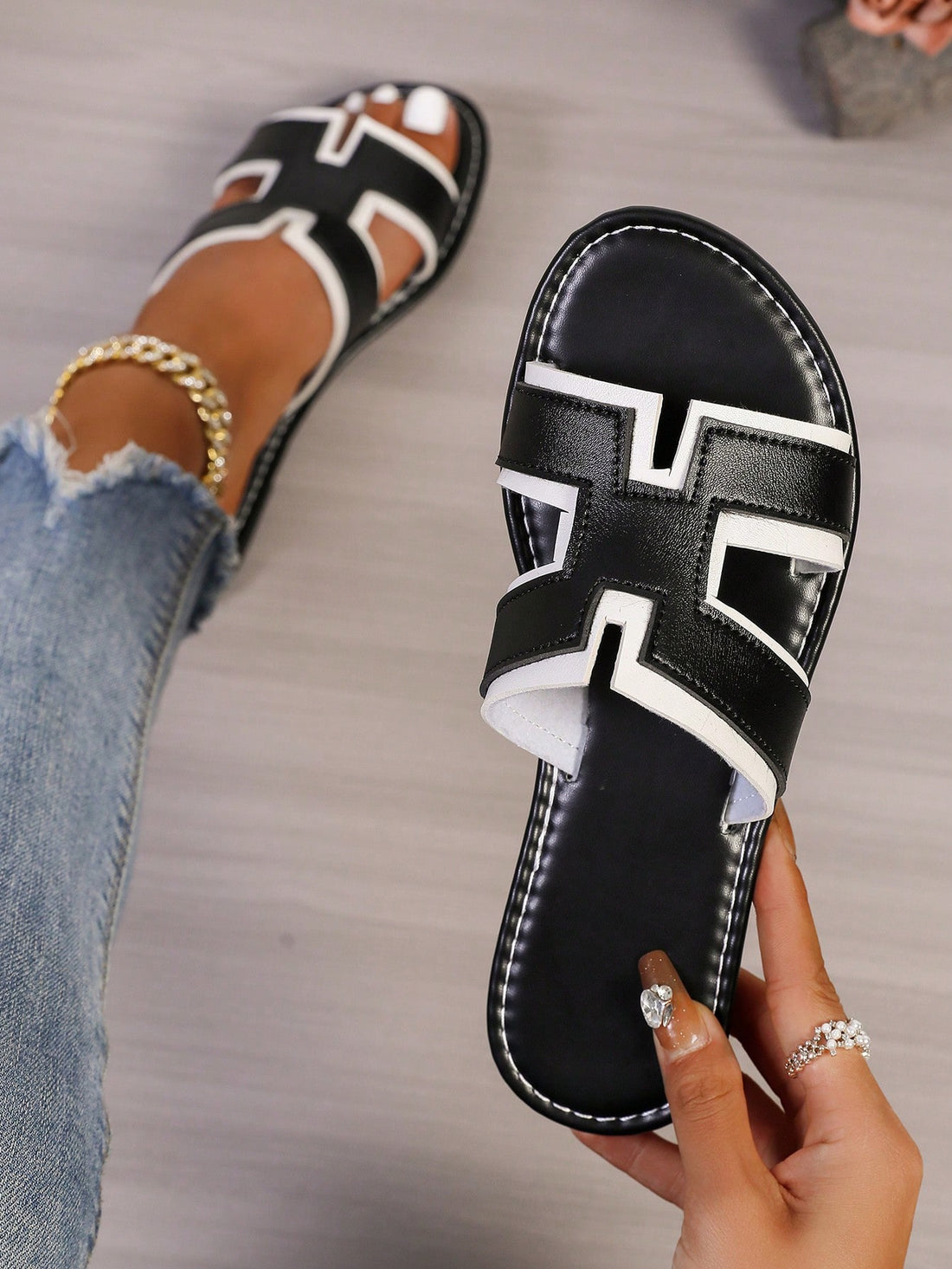 Step into summer with our playful H-strap slides! These versatile women's flat sandals are your go-to footwear for beach parties, poolside lounging, or casual strolls. The stylish H-strap design adds a fun twist to your outfit while keeping your feet comfy all day long. Perfect for those sunny days when you want to look cute without sacrificing comfort!