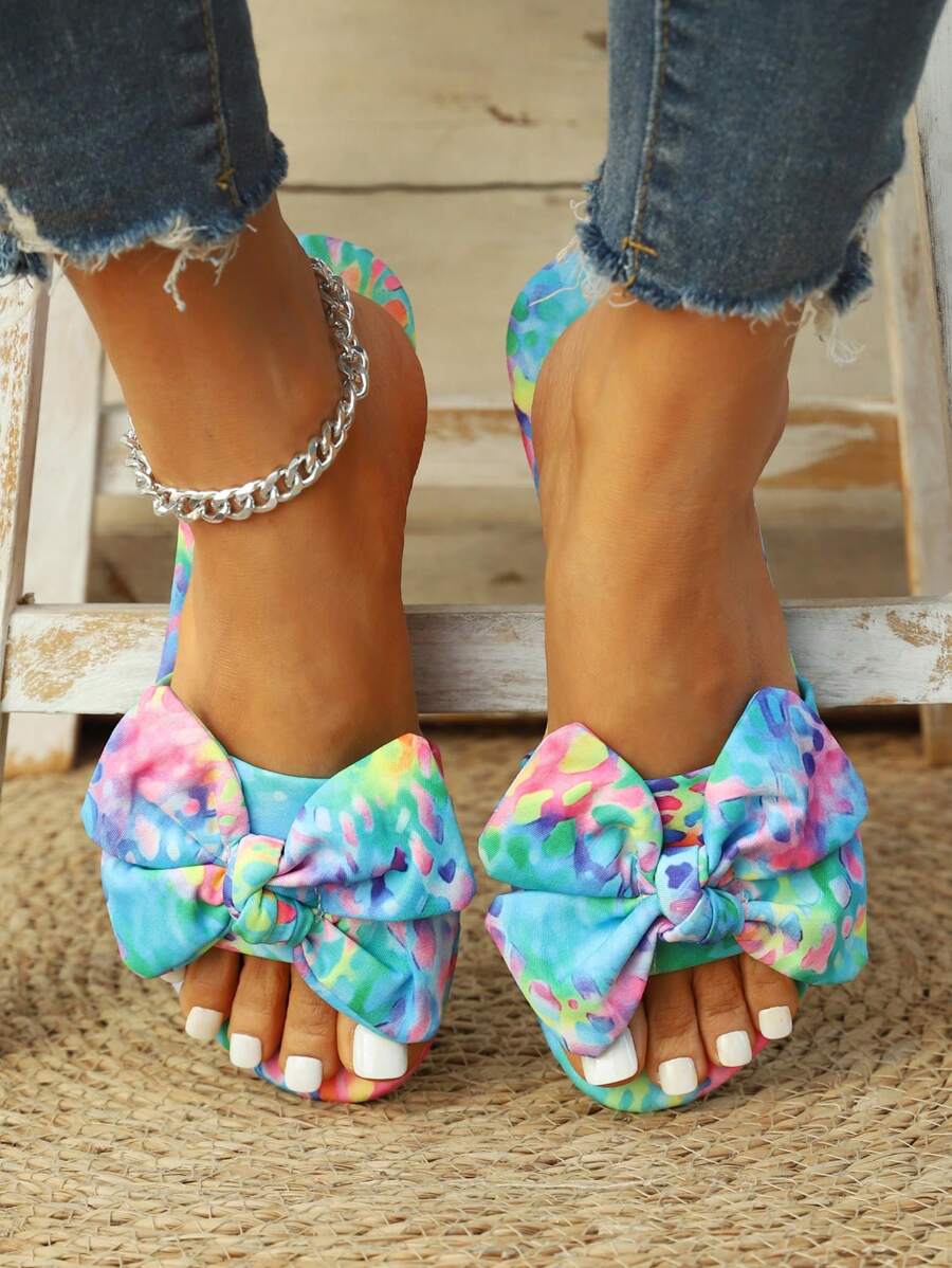 Step into summer fun with these Colorful Floral Flat Sandals, featuring charming butterfly accents that add a whimsical touch. Perfect for beach weddings or casual outings, their bohemian chic style brings vibrant flair to any outfit while keeping your feet comfy all day long. Let your toes dance in style and color wherever you go!