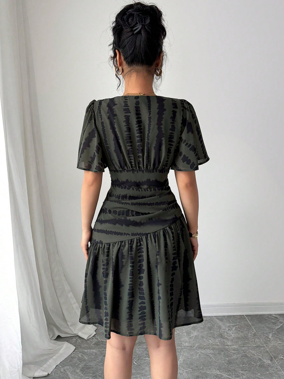 Get ready to make a fashion statement with our Chic Zebra Print A-Line Dress! Designed for spring and summer, this dress features a playful zebra print, elegant V-neck, and stylish bell sleeves. Perfect for afternoon tea parties and trendy commuting. Stay chic with this unique dress!