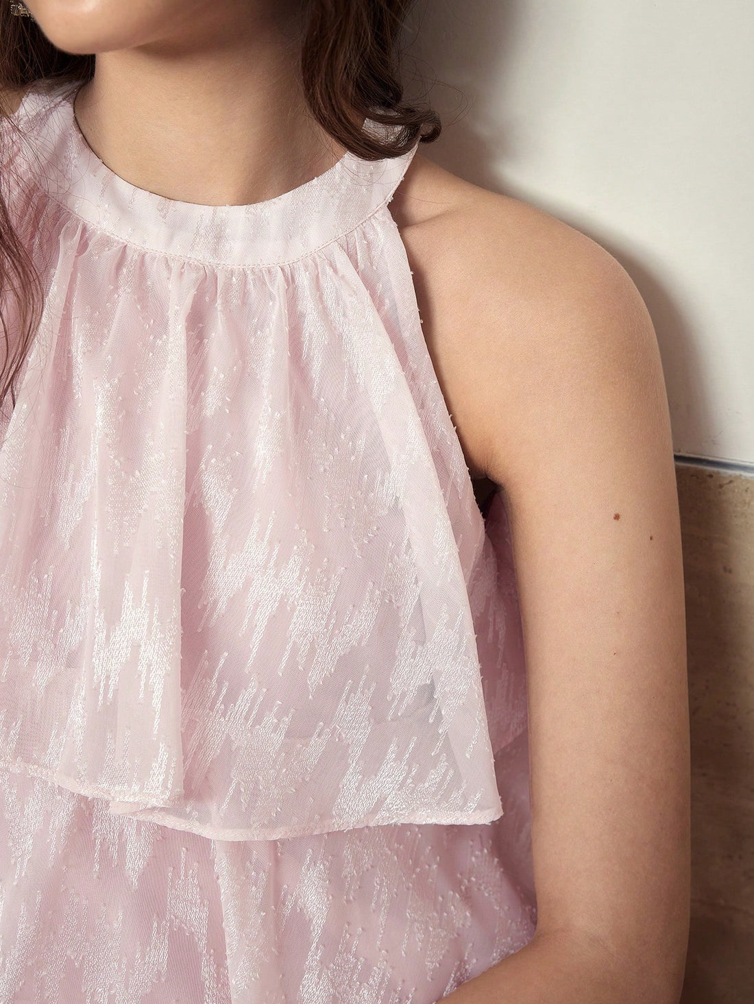 Step into the spotlight with this playful lace halter neck dress, designed to twirl and charm. Its tiered layers add a flirty bounce to every move, while the delicate lace brings a touch of timeless elegance. Perfect for effortless style that turns heads wherever you go.