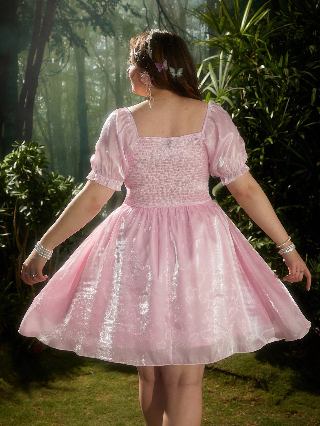 Upgrade your wardrobe with our Chic Plus Size Shiny Pink Dress for the stylish, confident woman. The cinched waist provides a flattering silhouette while the shiny pink material adds a touch of glamour. Perfect for any occasion, this dress will make you stand out in the crowd.