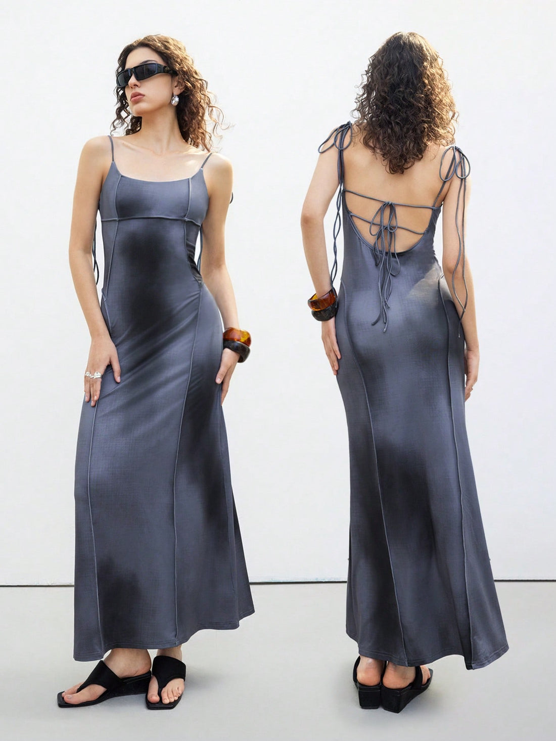 Step out in style with this playful and elegant sleeveless midi dress. Featuring delicate spaghetti straps and a charming tie-back detail, it offers a flirty yet sophisticated look perfect for any occasion. The flattering midi length adds a touch of grace, making it your go-to dress for sunny days or evening fun. Embrace effortless elegance with a twist of whimsy!