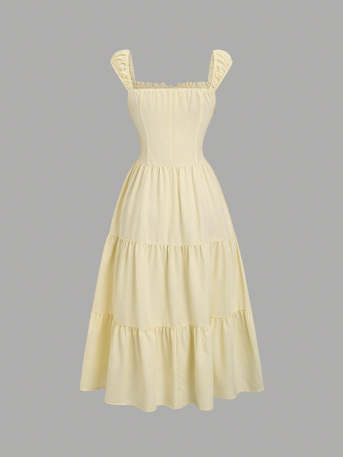 Step into timeless charm with this vintage-inspired plaid dress, featuring a playful ruffle hem and a chic square collar. Its minimalist design brings elegance with a fun twist, perfect for women who love classic style with a fresh, flirty edge. Whether for brunch or a casual day out, this dress adds a dash of whimsy to your wardrobe.