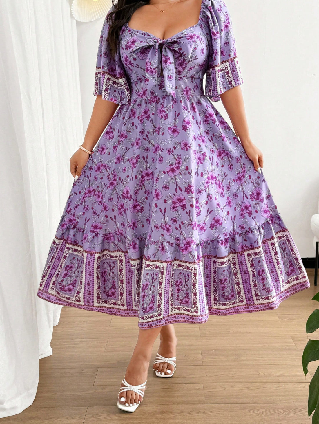 Step into summer fun with this Casual Ruffle Sleeve Dress, perfect for your next vacation getaway. Featuring playful ruffle sleeves and a trendy patterned design, it keeps you cool and stylish all day long. Whether you're strolling the beach or exploring new spots, this dress adds a breezy, carefree vibe to your look. Easy to wear and effortlessly chic, it’s your go-to for sunny adventures.