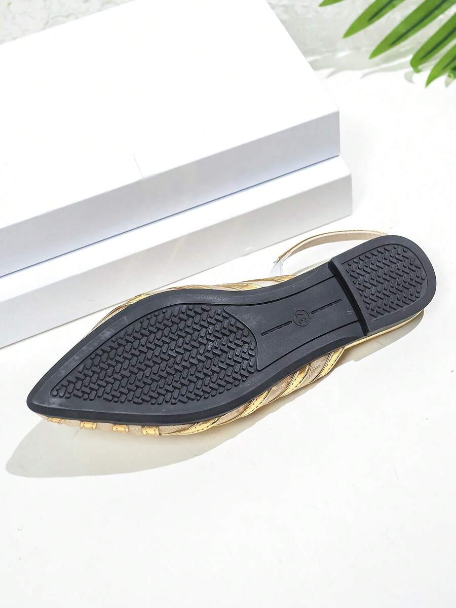 Step into sophistication with these gold mesh flat sandals, expertly crafted for the discerning dresser. Delicate lace inlays combine with precision laser stripe detailing to create an understated yet striking aesthetic. The flat sole ensures all-day comfort without compromising elegance, making these sandals ideal for garden parties, outdoor weddings, and upscale events. The metallic gold finish catches light beautifully while maintaining a refined appearance. Whether paired with flowing dresses or tailore