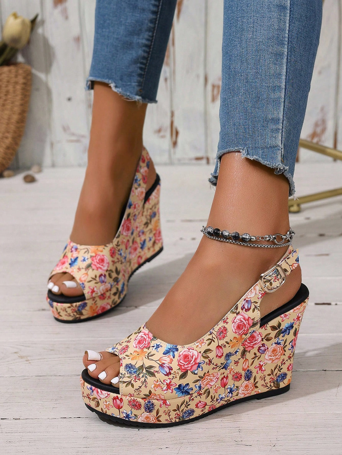 Step out in style with these playful plus size ditsy floral open toe wedge sandals. Designed to add a pop of fun to any outfit, their comfortable wedge heels make them perfect for all-day wear, whether you're headed to brunch or a night out. The charming floral pattern and open toe design keep your look fresh and flirty, making these sandals a must-have for every occasion.