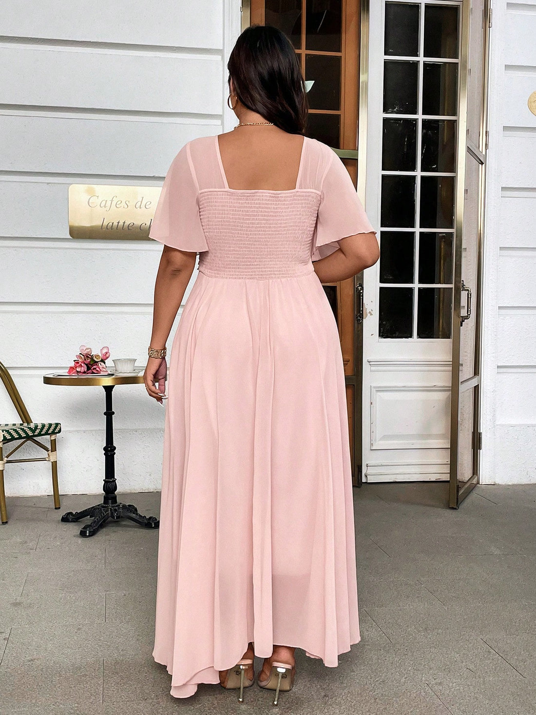Step into the spotlight with this playful plus-size chiffon dress, designed to flatter every curve. Featuring a chic V-neck and breezy short sleeves, its bodycon fit blends elegance with comfort. The flowing A-line maxi silhouette makes it perfect for spring and summer soirées, ensuring you dance the night away in style and ease.