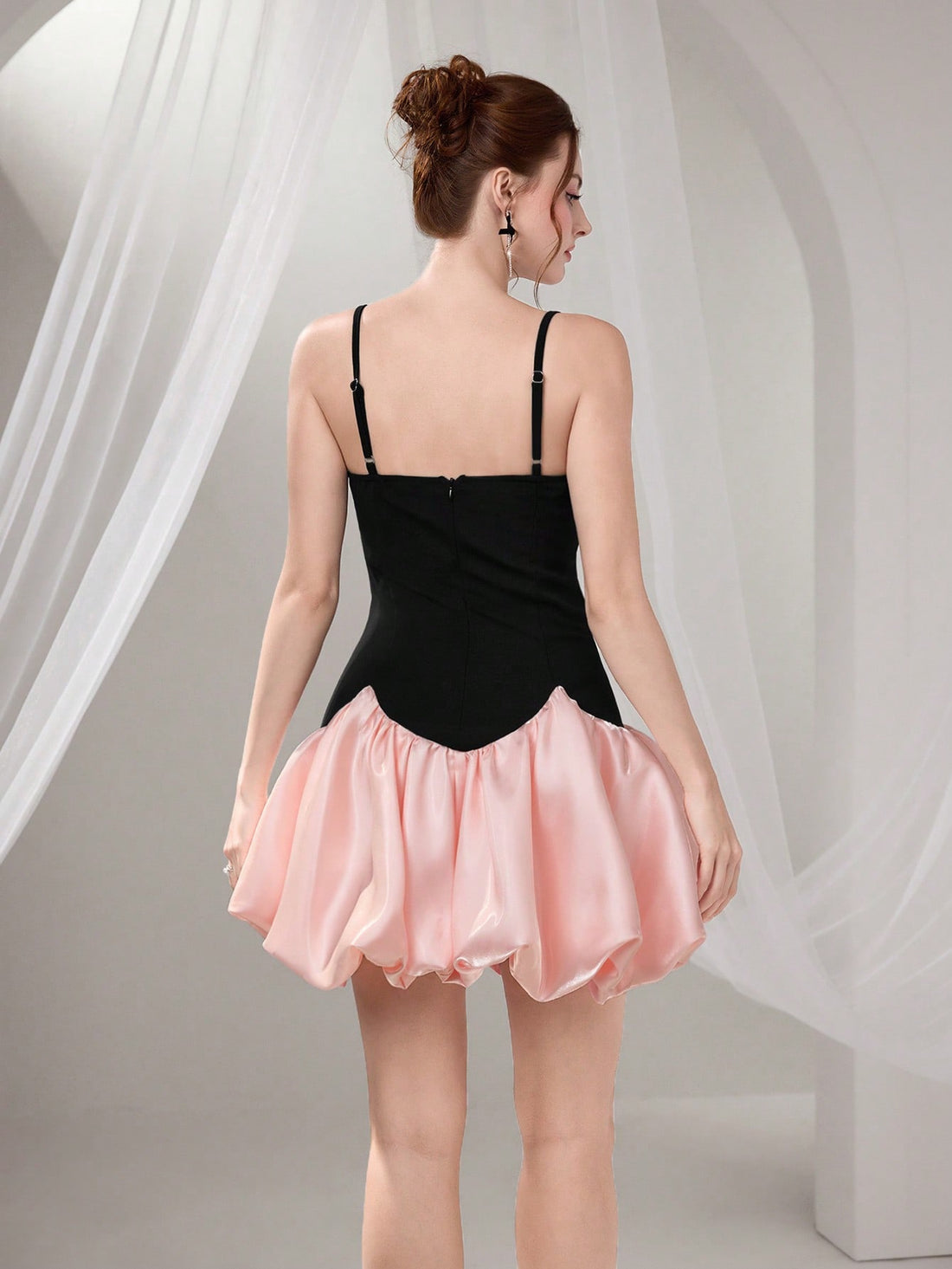 Make a statement in this stunning color block camisole dress that effortlessly transitions from graduation ceremonies to evening soirées. The chic bowknot detail adds a flirty touch, while the sleek silhouette flatters every figure. Crafted for the modern woman who refuses to compromise on style, this versatile piece pairs beautifully with heels for formal events or sneakers for a more relaxed vibe. Whether you're celebrating milestones or dancing the night away, this dress is your go-to companion for looki