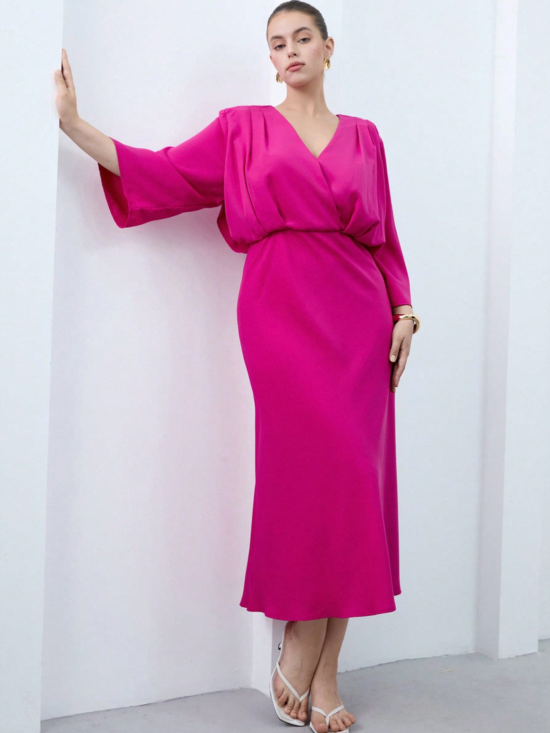 Step out in style with this Elegant V-Neck Long Dress designed to flatter every curve. The cinched waist highlights your silhouette, while the playful 3/4 sleeves add a touch of charm. Its solid color keeps things simple yet stunning, perfect for any occasion where you want to shine effortlessly.
