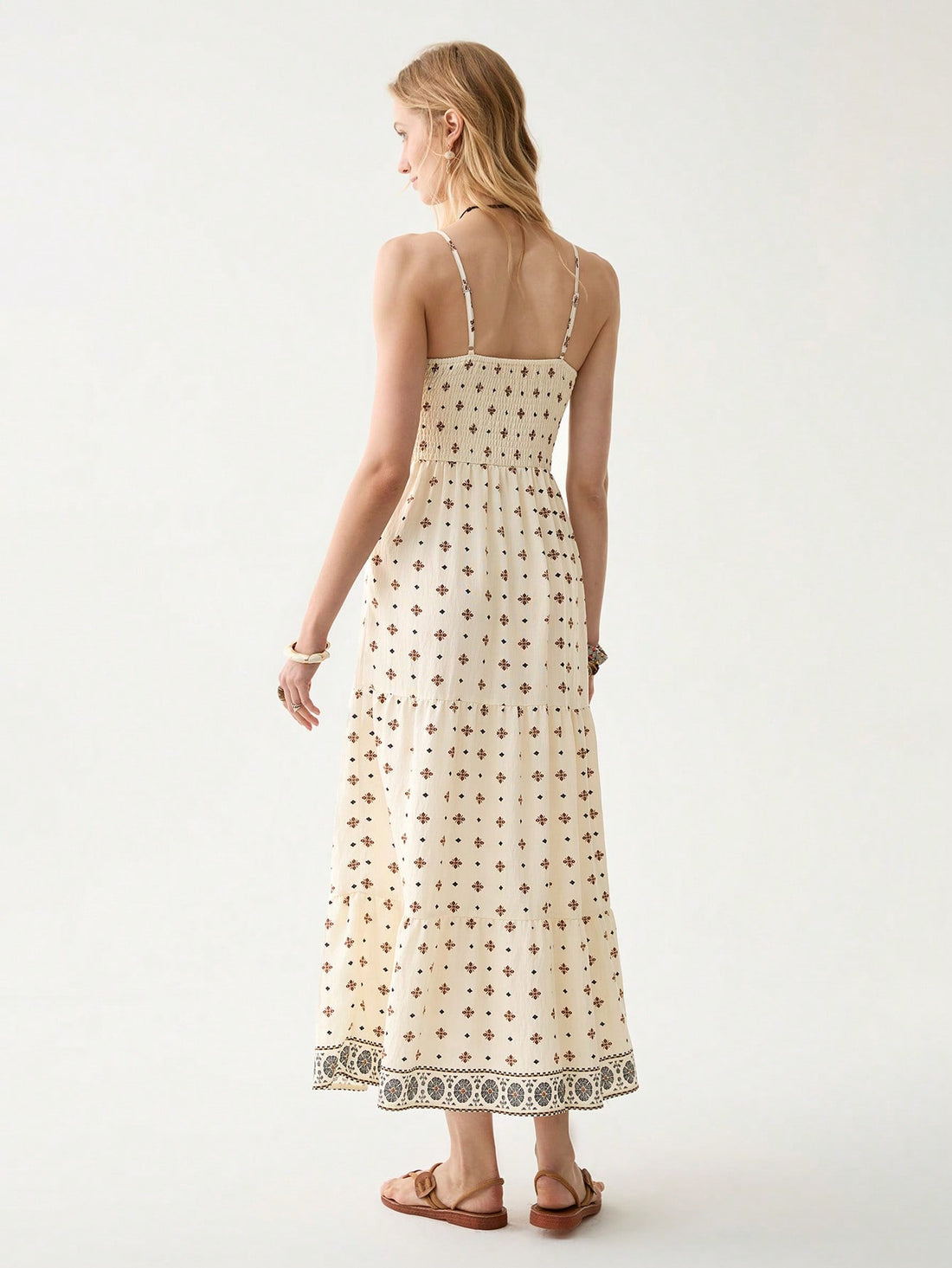 Slip into vacation mode with our Bohemian Spaghetti Strap Dress! This flirty number combines elegance with carefree vibes, perfect for twirling through cobblestone streets or sipping cocktails at sunset. The lightweight fabric dances with every step, while the spaghetti straps keep you cool during those warm holiday adventures. Pack light, look fabulous!