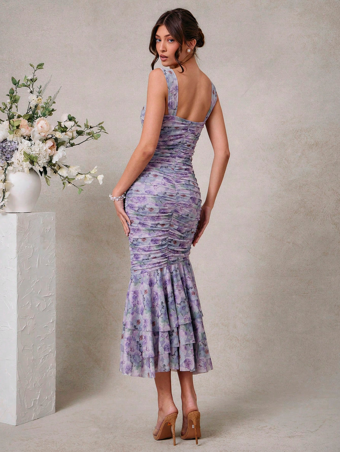 Step into summer’s spotlight with this Stunning Floral Mesh Midi Dress! Featuring a whimsical asymmetric hem and delicate floral mesh, it’s designed to keep you light on your feet while turning heads at any wedding. Flowy, flirty, and effortlessly elegant, this dress lets you dance through the celebration in style and comfort. Get ready to steal the show and steal some hearts!