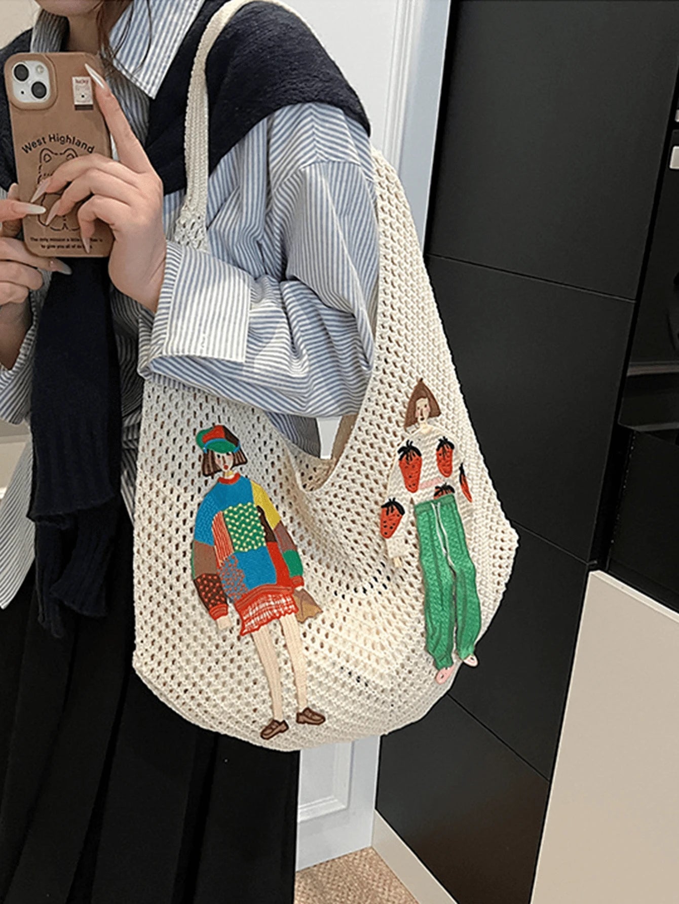 Cream crochet mesh shoulder bag mirror view with colorful fashion figure appliques