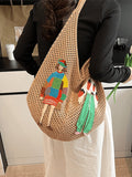Close-up tan crochet mesh hobo bag with colorful fashion figure appliques