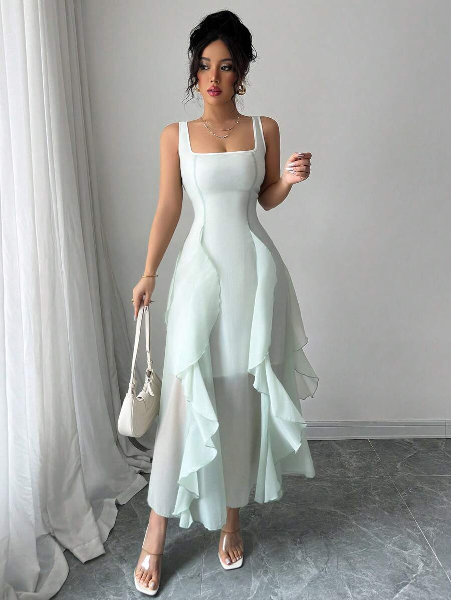 Step into fun and flair with this Women's Green Mesh Ruffle Hem Dress! Light and breezy, it’s perfect for twirling at weddings, dancing through parties, or catching sunshine on vacation. The playful ruffle hem adds a flirty touch while the vibrant green mesh keeps things cool and chic. Get ready to turn heads wherever you go!