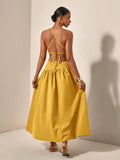 Back view yellow maxi dress with crisscross tie straps and open back