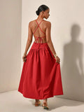 Back view red maxi dress with crisscross tie straps and full gathered skirt