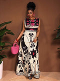 Close-up view of tropical rainforest plus size maxi dress for elegant spring/summer vacations and everyday chic with summer styling for summer casual wear
