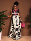 Close-up view of tropical rainforest plus size maxi dress for elegant spring/summer vacations and everyday chic with summer styling for summer casual wear