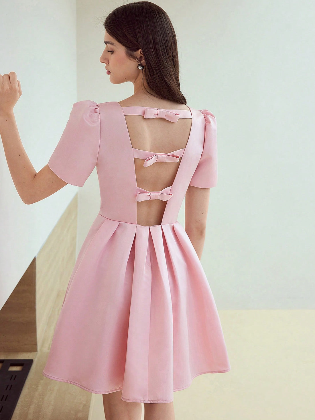 Step out in style with this playful Puff Sleeve Dress featuring a charming bow decor. Its voluminous sleeves add a flirty touch, while the bow detail brings a sweet, feminine flair. Perfect for any occasion, this dress effortlessly combines elegance with fun, making you the center of attention wherever you go.