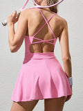 pink crisscross open back tennis mini dress with built in pocket shorts image 2