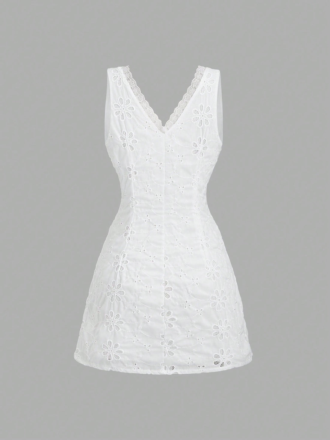 Step into charm with the Graceful Embroidered Mini Dress! Featuring a flirty V-neck, delicate lace trim, and slender spaghetti straps, this dress effortlessly blends sweet and sassy. Perfect for twirling through sunny days or dancing into the night, it’s your go-to for a playful yet elegant look that turns heads wherever you go.