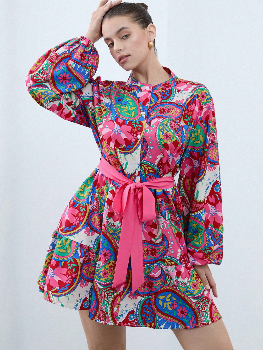 Step out in style with this playful plus size dress featuring a bold geometric print and a flattering belted waist. Its long sleeves offer comfort and coverage, making it perfect for casual days when you want to feel effortlessly chic. Easy to wear and fun to flaunt, this dress adds a splash of personality to your everyday wardrobe.