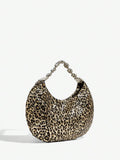 Side view of stylish bling leopard print top handle bag for elegant evening events and parties with leopard print, bling finish, top handle for party styling