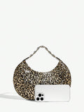 Close-up view of stylish bling leopard print top handle bag for elegant evening events and parties with leopard print, bling finish, top handle for party styling