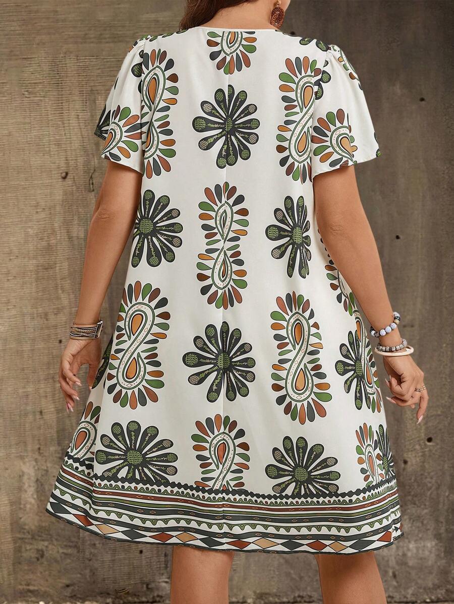 Step into effortless style with this Chic Plus Size Floral V-Neck Ruffled Dress. Its playful ruffles and vibrant floral print bring out your inner boho goddess, perfect for any season. The flattering V-neck highlights your neckline while offering comfort all day long. Whether you’re brunching or dancing under the stars, this dress keeps you looking cool, confident, and carefree.