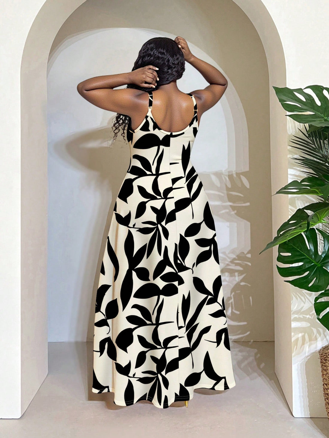 Step into vacation mode with this playful plus-size dress featuring a vibrant colorblock leaf print. Its flowy, sleeveless design keeps you cool and comfortable while adding effortless style to any outing. Perfect for sunny days and breezy evenings, this dress blends ease and charm in one flattering look.