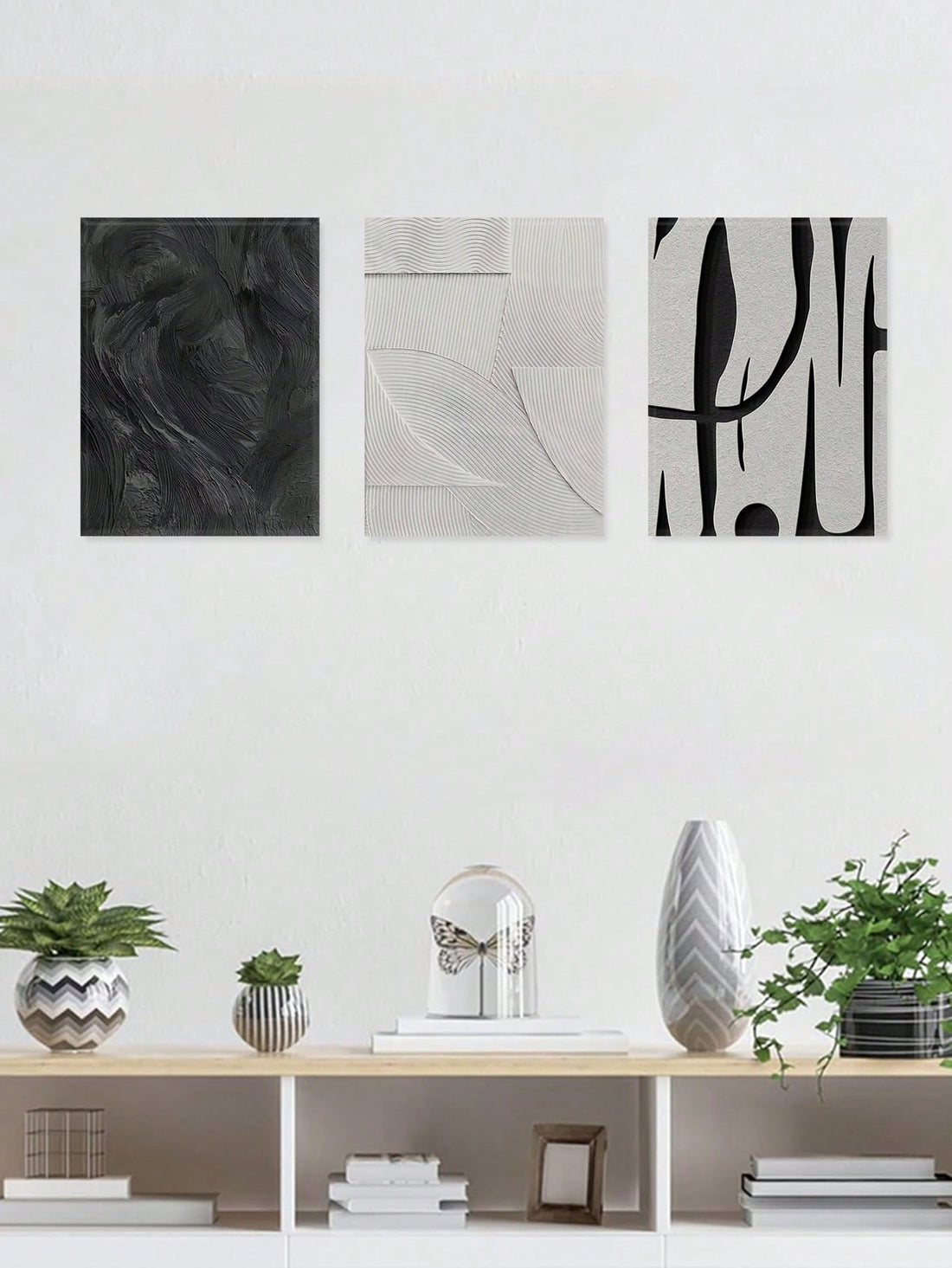 Bring a splash of sleek sophistication to your space with this Elegant Monochrome Abstract Texture Wall Art Set. These minimalist canvas prints blend subtle textures and shades of black and white, creating a stylish backdrop that’s as playful as it is polished. Perfect for adding a modern twist to any room, they effortlessly elevate your home decor without overwhelming your vibe. Let your walls do the talking with this chic, artful ensemble!