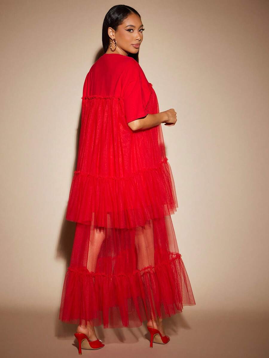 Twirl into festival season with this dreamy boho tulle maxi dress that's equal parts whimsical and effortlessly chic. Layered tiers create romantic movement with every step, while the flowing silhouette keeps you cool and comfortable under the summer sun. Perfect for music festivals, garden parties, or any occasion calling for bohemian vibes. Pair it with your favorite sandals and let your free spirit shine.