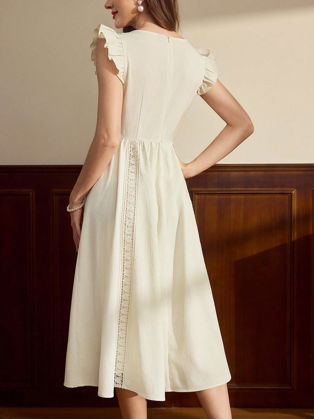 Dress up in this Elegant Vintage Ruffled Bell Sleeve Midi Dress for a perfect look on Mother's Day, at graduations, or summer weddings. With its charming ruffled bell sleeves and timeless midi length, you'll be making a stylish statement everywhere you go. So go ahead, be the belle of the ball!