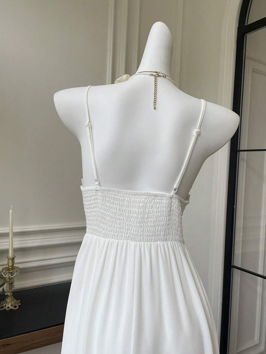 Get ready to dance to your own tune in this Bohemian V-Neck Sleeveless Long Dress! Perfect for music festivals, this dress features a stylish V-neck and sleeveless design, and is made with a flowy material that will keep you feeling and looking cool. With an elegant white style, you can stand out while staying comfortable.