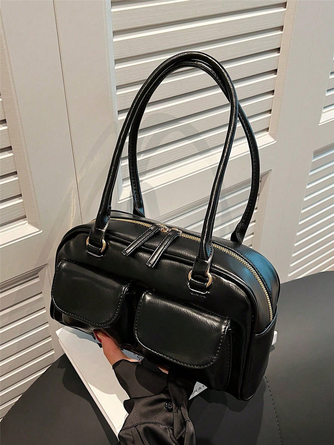 Meet your new favorite sidekick—the Stylish Black Multi-Pocket Biker Shoulder Bag for Women! Ready for anything, this versatile tote effortlessly transforms from a sleek commuter companion to a cozy pillow bag. Multiple pockets keep your essentials organized while adding an edgy biker charm to your everyday look. Perfect for city streets or weekend adventures, it’s the bag that works as hard and plays as much as you do.