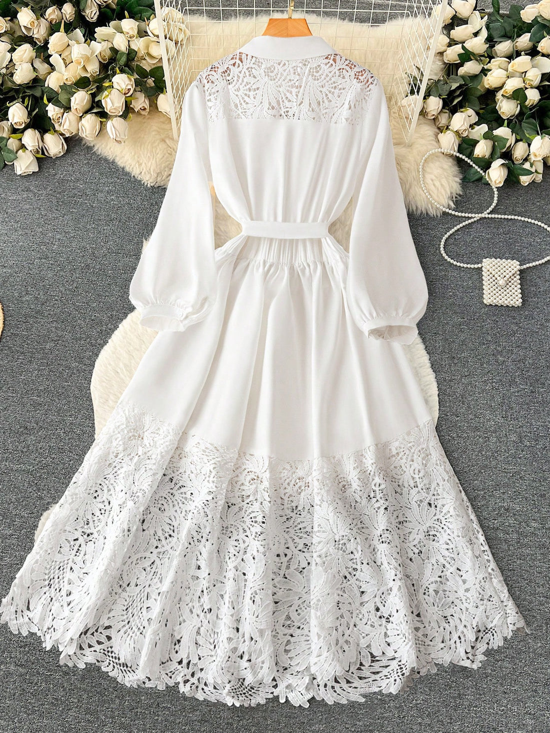 Step into the office with a touch of romance in this Elegant Plus Size Women’s Shirt Dress. Featuring delicate lace details and a flattering tie waist, it combines comfort with charm. Perfect for those who want to feel confident and stylish while keeping things playful at work.