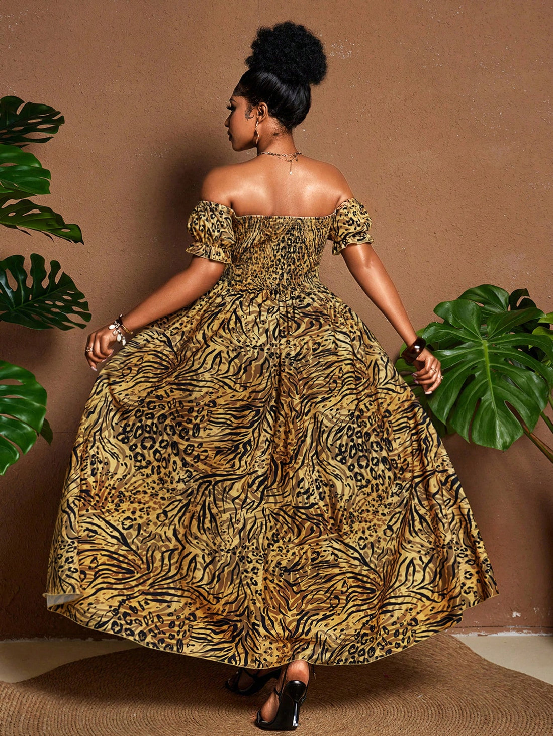 Make a statement with this playful zebra print off-shoulder dress designed specifically for plus-size figures. The sweet princess style adds a touch of whimsy while the off-shoulder design shows just the right amount of skin. Perfect for summer parties, casual outings, or whenever you want to feel fabulous and fierce in your own unique style!