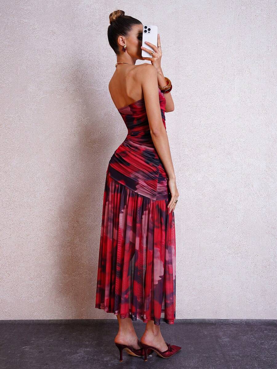 Turn heads effortlessly in this Elegant Women's Fitted Ruffle Bandeau Dress. Its sleek, figure-hugging design and playful ruffle detail add a flirty touch perfect for any stylish occasion. Whether you're dancing the night away or enjoying a chic gathering, this dress combines comfort and charm to keep you feeling fabulous all evening long.