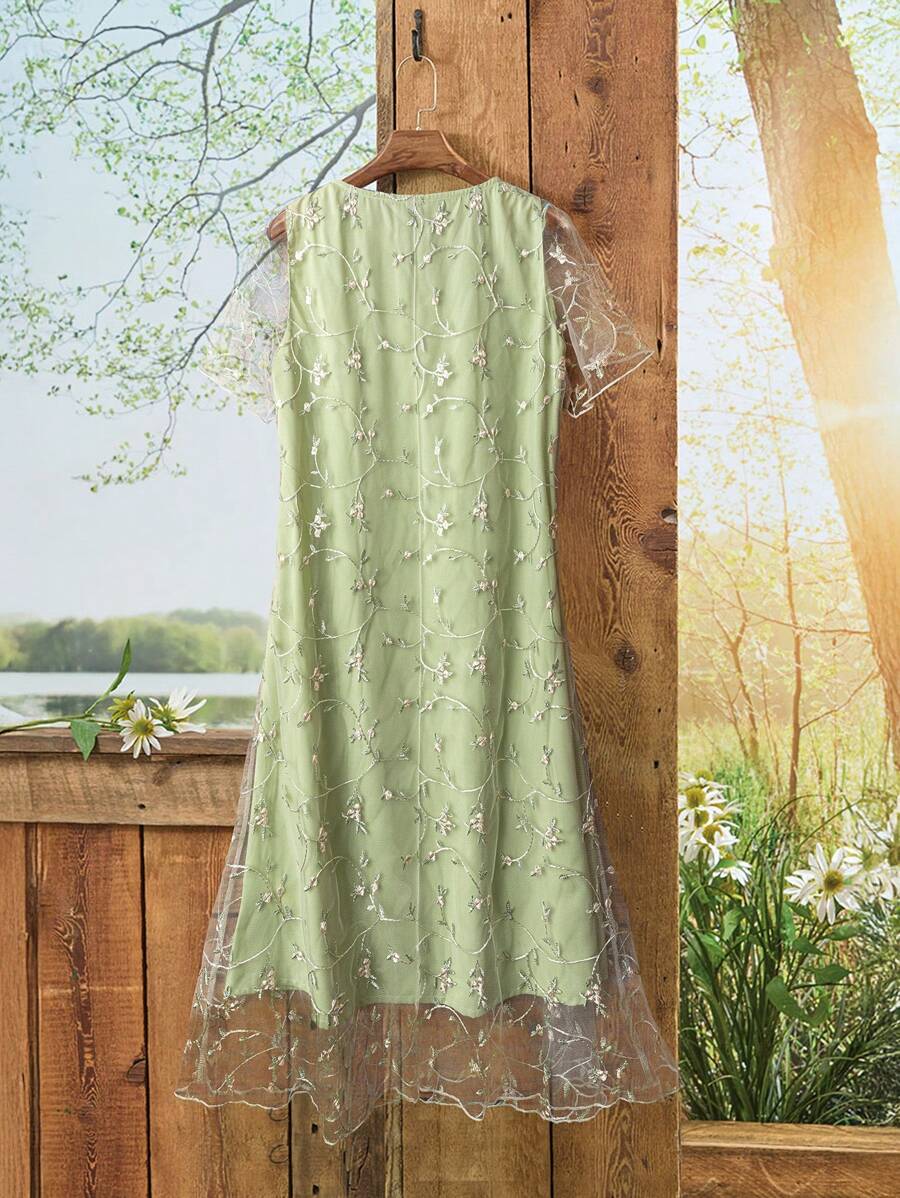 Get ready to turn heads in our Elegant Embroidered Mesh Midi Dress! This stunning dress features intricate embroidery and a flattering midi length, perfect for any summer occasion. Stay stylish and cool with this must-have summer fashion piece.