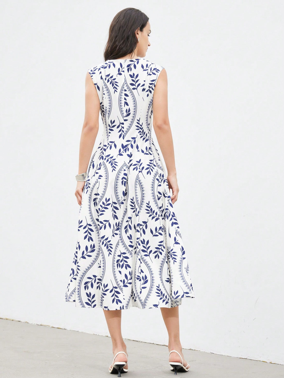 Step into effortless charm with this Elegant Leaf Print Dress. Featuring a playful flared hem and a minimalist round neck, it’s perfect for resort days or casual outings. The delicate leaf pattern adds a touch of nature-inspired fun, while the comfortable fit lets you move with ease and grace. Embrace a breezy, stylish look that’s as lively as your spirit.