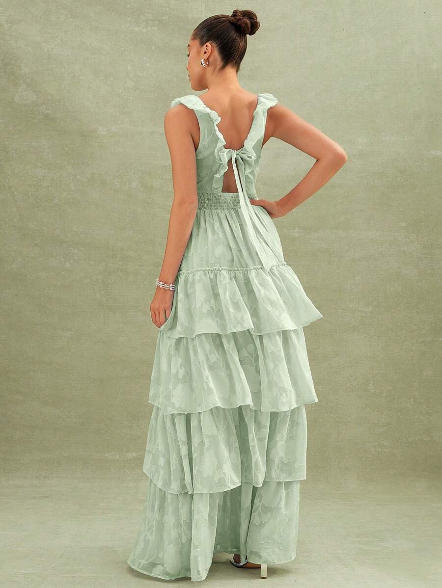 Step into effortless charm with this Floral Textured Tiered Ruffle Maxi Dress. Its playful tiered ruffles and delicate floral texture add a breezy, boho vibe perfect for anything from garden parties to weekend getaways. Comfortable and flowy, it’s your go-to for turning heads and feeling fabulous all day long.