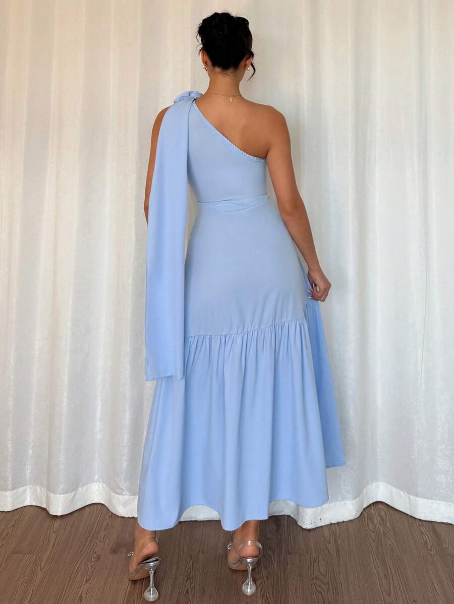 Get ready to turn heads this summer with our elegant blue chiffon dress! Featuring stunning 3D floral applique and an oblique shoulder design, this dress will make you feel like a goddess. Perfect for any occasion, it's the ultimate combination of style and comfort. Dare to stand out and embrace your unique style with this one-of-a-kind dress.