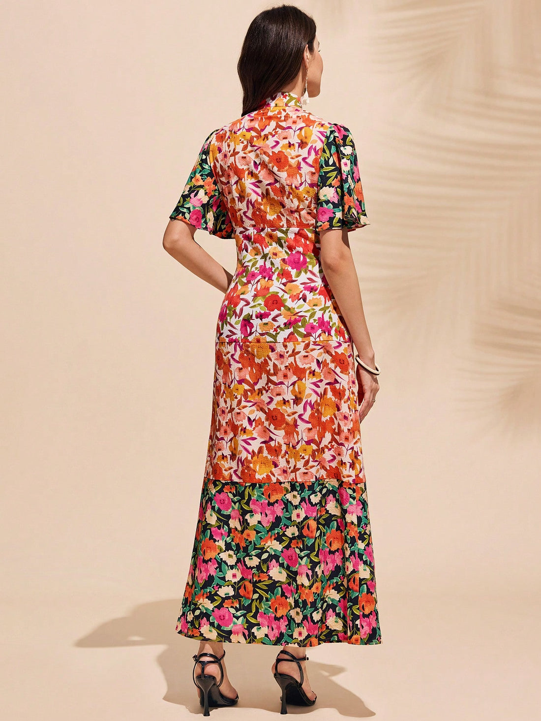 Be the belle of the ball in this Elegant Floral Patchwork Ruffle Midi Dress! With its cinched waist, this dress will flatter your figure and add a touch of elegance to your look. The floral patchwork and ruffle details add a playful touch to this sophisticated piece. Perfect for any occasion!
