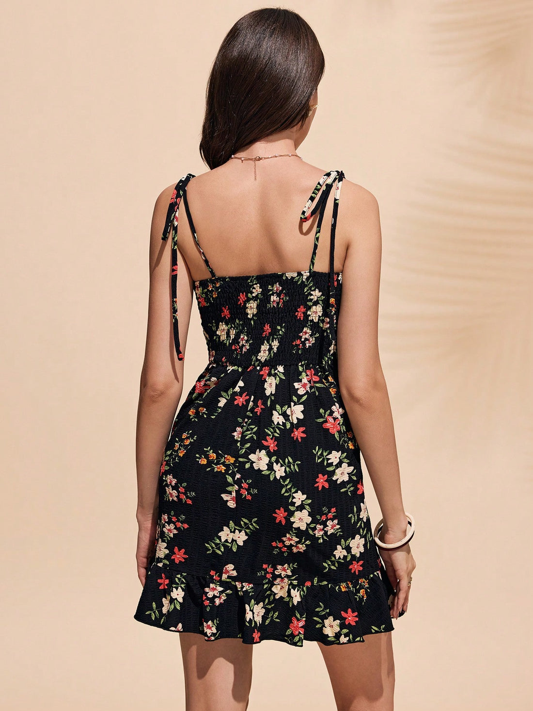 Introducing our Charming Summer Dress! This short camisole dress features a delicate ditsy floral pattern that is sure to turn heads. With its breezy and lightweight material, it's perfect for those hot summer days. Feel effortlessly stylish and comfortable with this must-have dress.